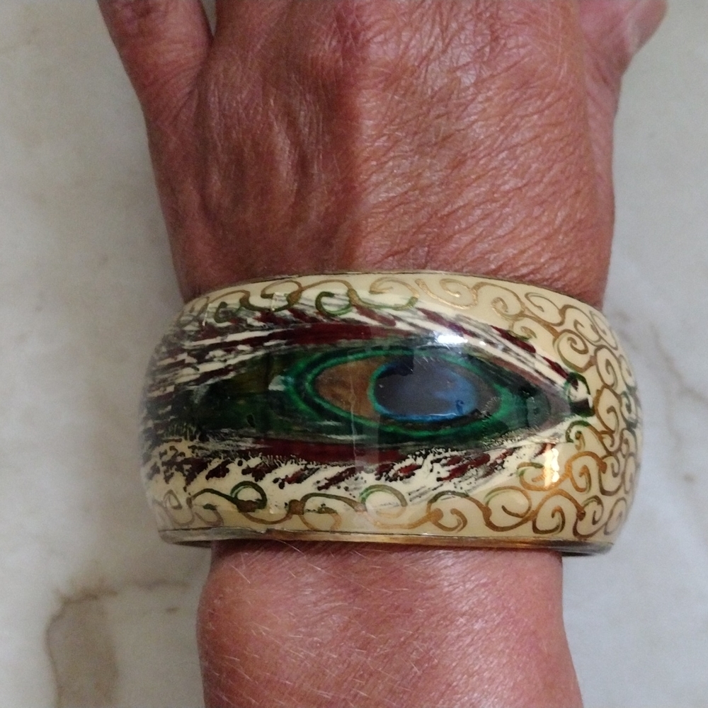 Beautiful peacock feather cuff bracelet.